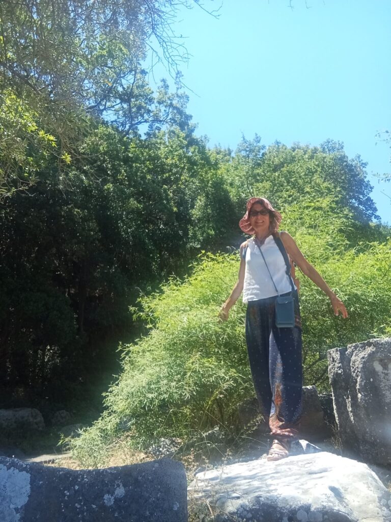 Alessandra Marazzi walking in nature during her Mediterranean herbal journey